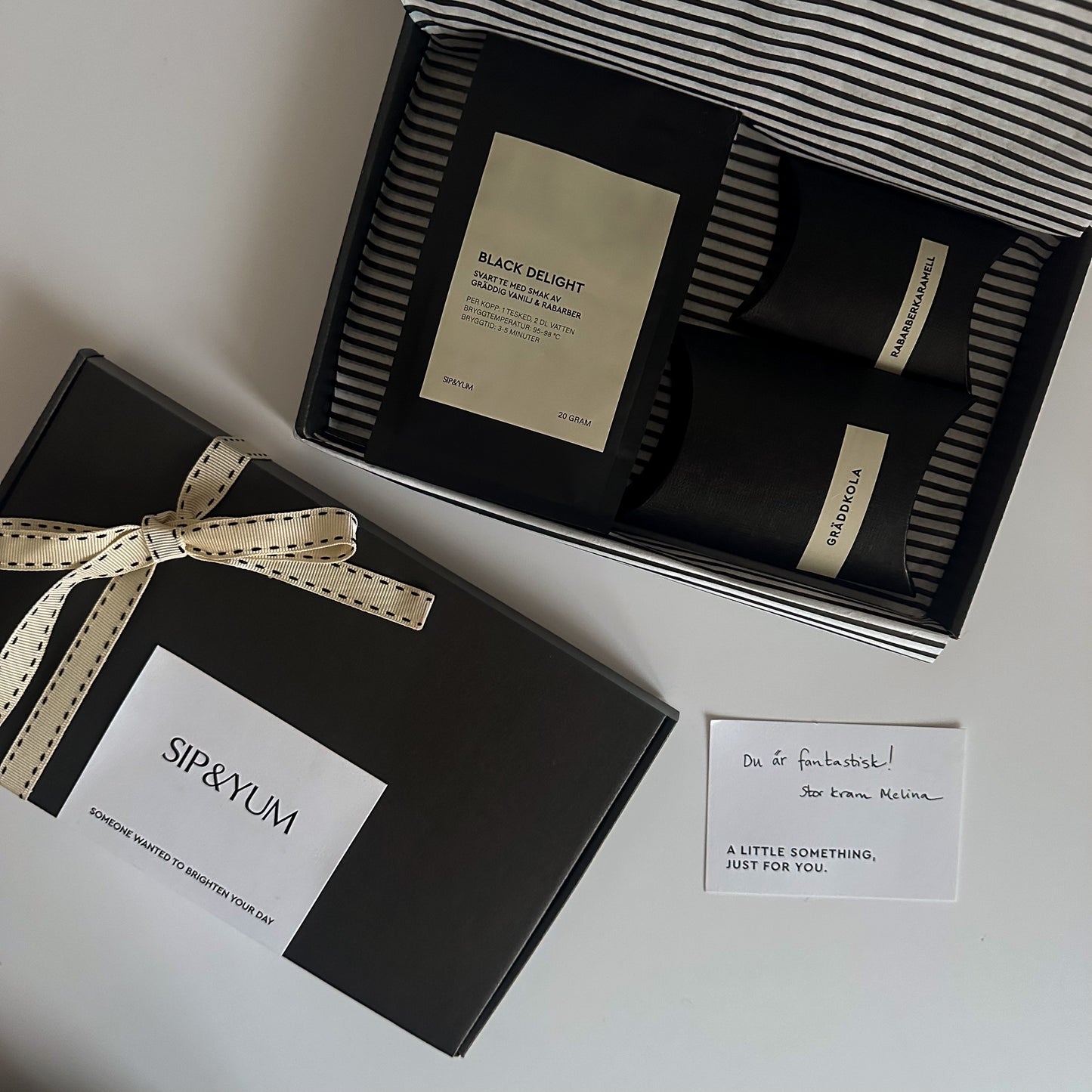 presentbox med te, godis och personlig hälsning